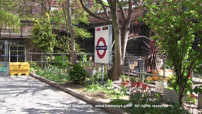 London Underground trains at South Kensington station, Circle and District