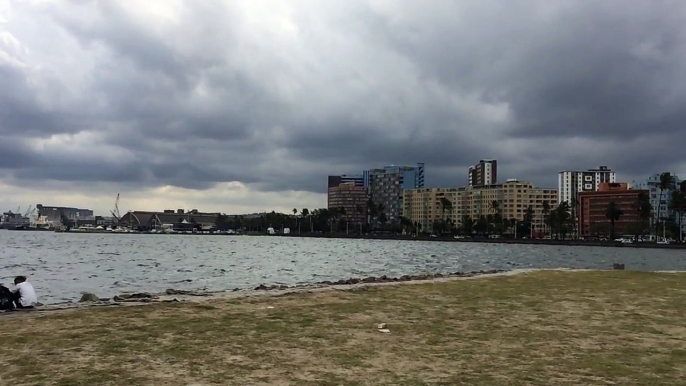 Young Zulu boys throwing stones into Indian ocean - Durban, South Africa