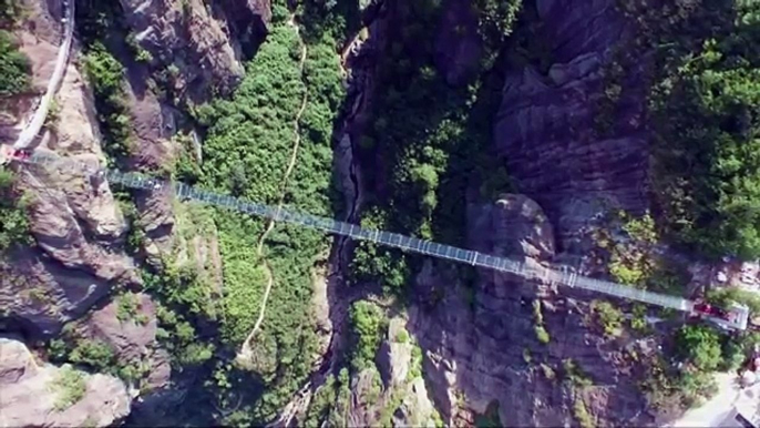 Raw- Tourists Brave Glass-Bottom Bridge -