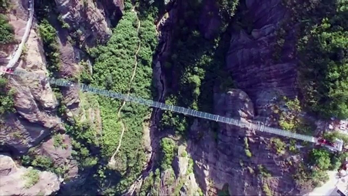 Raw- Tourists Brave Glass-Bottom Bridge