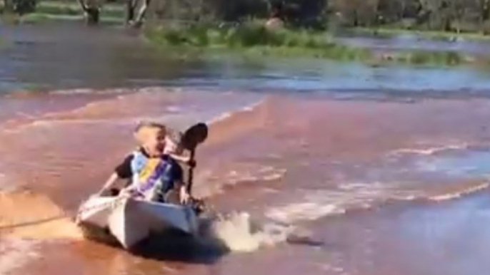 Forbes Kids Look for the Fun in Flooding as Natural Disaster Zone Declared