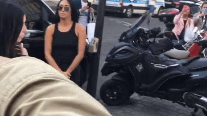 Prankster Vitalii Sediuk Fails in Attempt to Kiss Kim Kardashian's Derrière in Paris