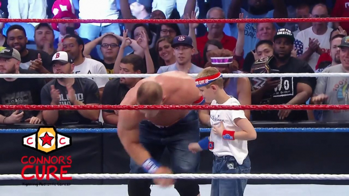 John Cena brings a brave WWE Universe member into the ring after Raw: July 4, 2016