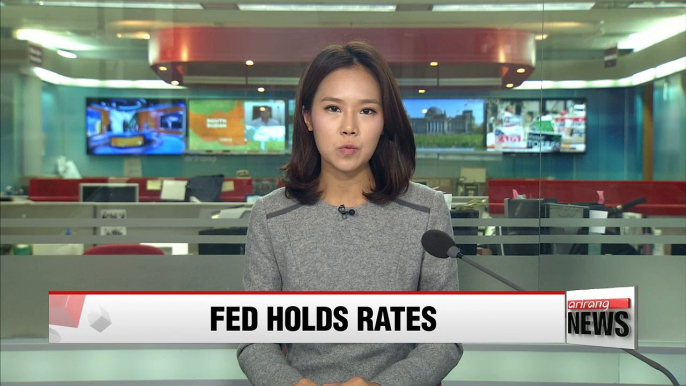 U.S. Fed keeps rates unchanged, hints at possible hike in December