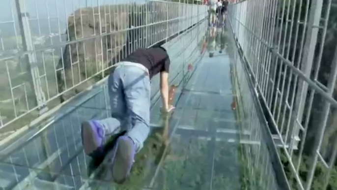 Tourists Brave Glass-Bottom Bridge