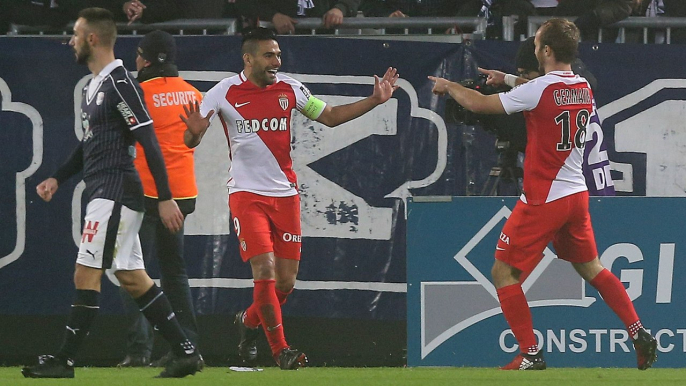 Falcao hattrick sends Monaco top