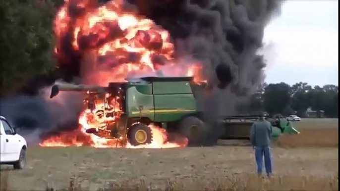 The amazing of big john deere combine fire complications - truck on fire rolls into fire truck