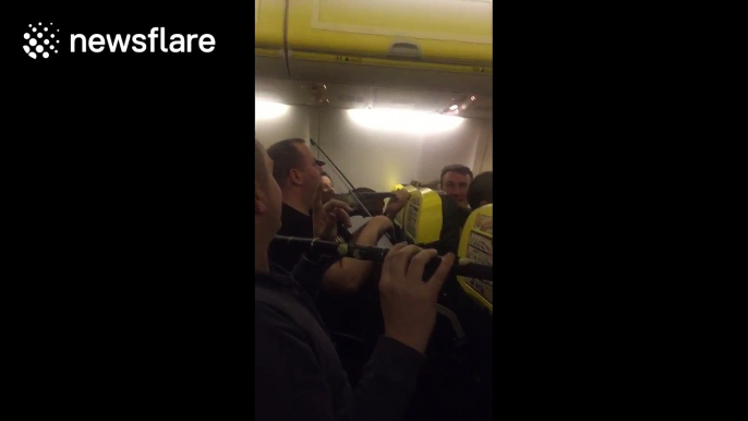 Musicians 'cheer up' air stewards with impromptu performance on flight