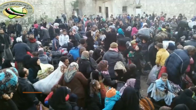 Thousands of civilians flee rebel-held Aleppo amid devastating bombing