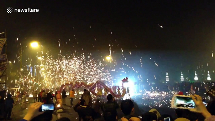 Artists perform Fire Dragon Dance to celebrate Chinese New Year