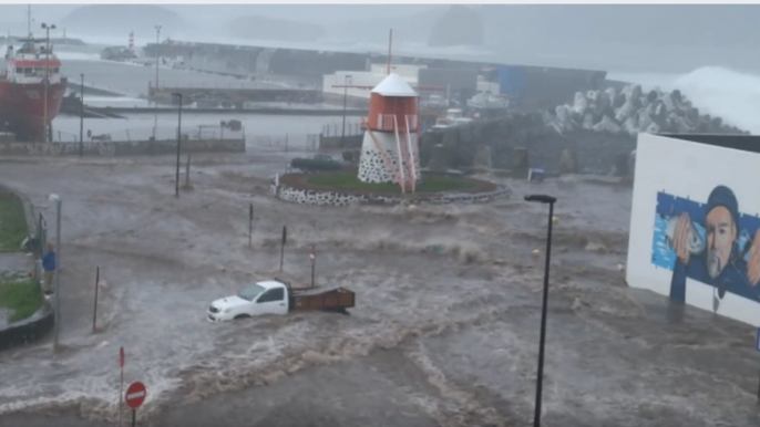 Waves Flood Harbor of Town in Azores During Storm