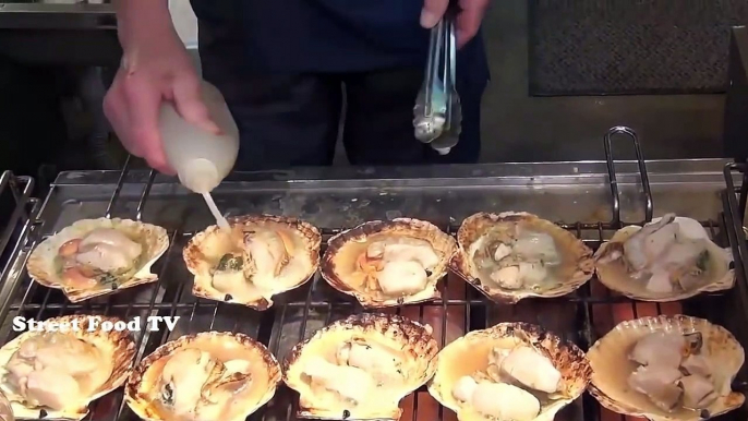 Japanese street food is cooked by the Japanese abalone - seafood delicious lobster