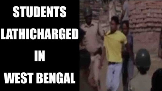 West bengal police lathi-charge students for cheating in exam: Watch video | Oneindia News