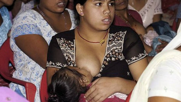 Breast feeding husband poor and hungry husband saved by wife