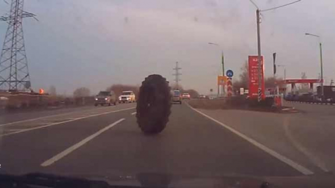 Close call with rolling tire