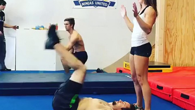 Strong Man picks up the girl at the Gym