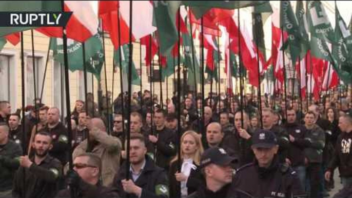 'Death to enemies of homeland': Nationalists march through Warsaw, heckled by counter-protesters