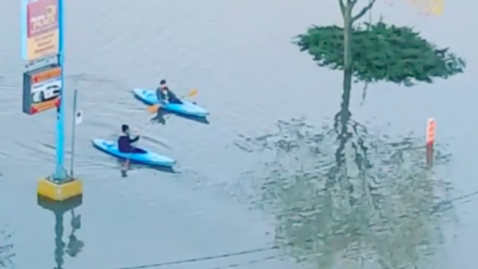 Residents Use Kayaks to Travel Around Flood-Stricken Quebec