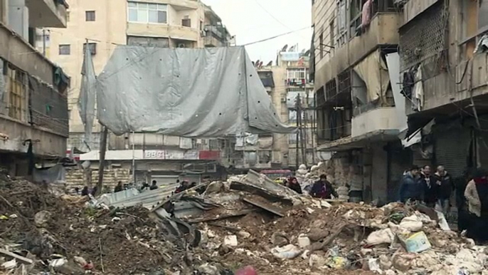 Syria army, civilians reclaim ruined Aleppo streets[1]