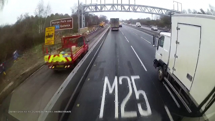 Dash cam captures dramatic truck accident on UK motorway