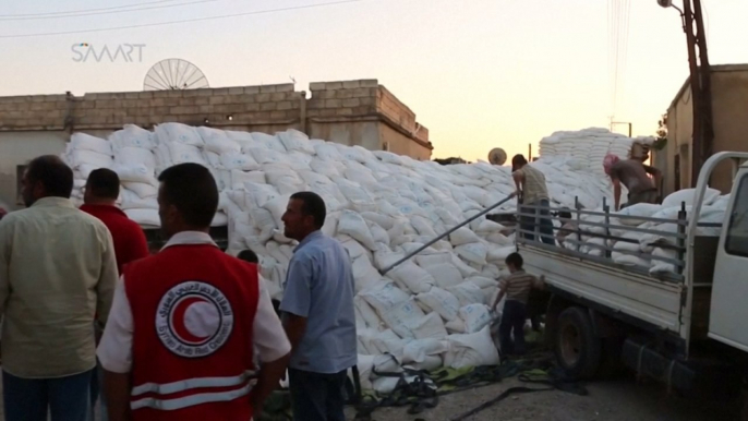 Syria: Aid convoy arrives in besieged area for first time since June