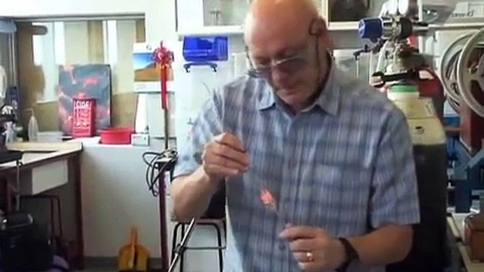 344.Scientific glassblower crafts a Christmas bauble