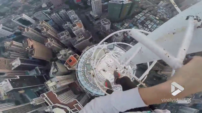 Ils escaladent une ancienne antenne à 600m du sol en Chine !