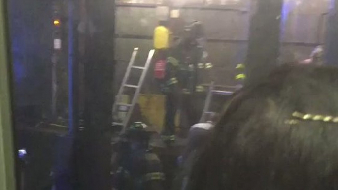 Firefighters Evacuate Trapped Subway Passengers