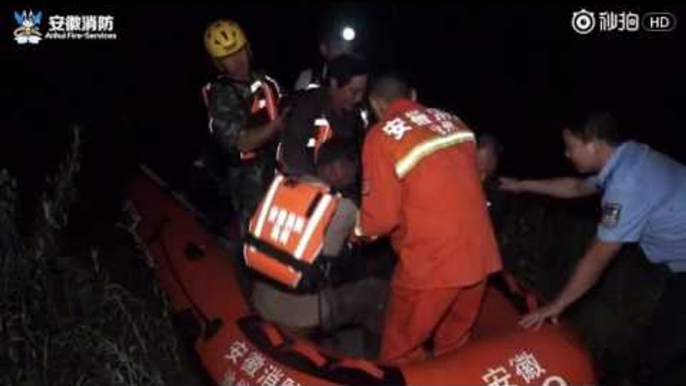 Firefighters Rescue Villagers Stranded in Chinese Floods