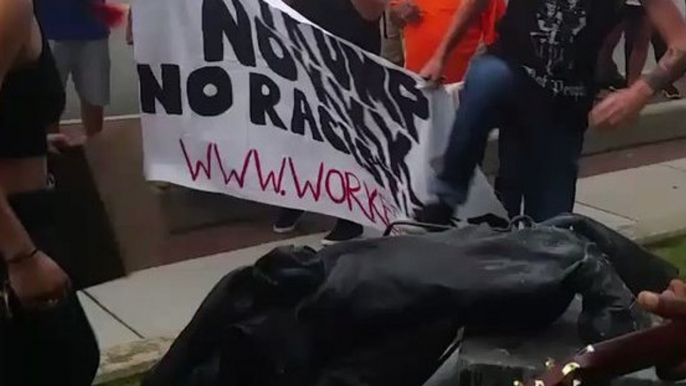 Durham Demonstrators Kick Toppled Confederate Monument