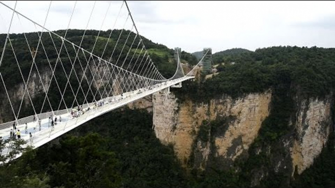 China opens longest glass bottom bridge in world