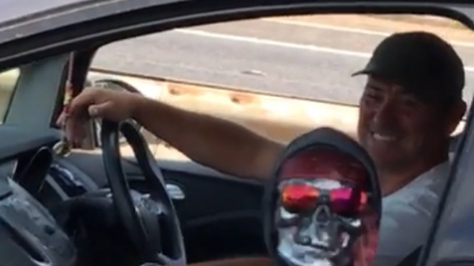Kid In A Mask Is Here To Make Sure You're Never Bored While You're Driving