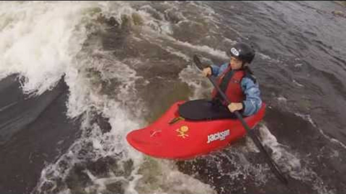 Father and Son Enjoy Canoeing Adventure