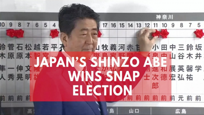 Japan's Prime Minister Shinzo Abe clinches landslide victory in snap election