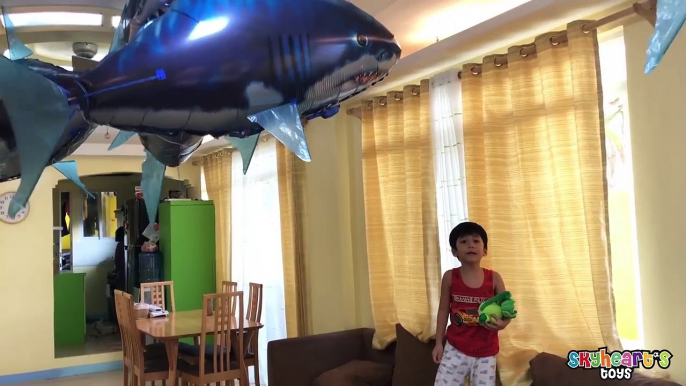 FLYING SHARKS inside our house! Skyheart Toys plays with air swimmer balloons for kids-l53xacbsOvQ