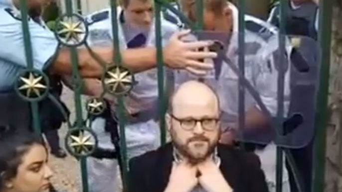 Police Remove Immigration Activists Chained to Gate of Australia PM's Residence