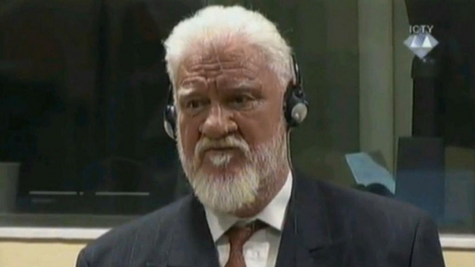 Croatian war criminal Slobodan Praljak dies after taking poison in court - Croatian state TV