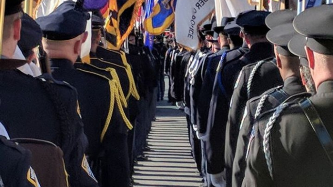 Officers, Mourners Gather for the Funeral of Slain Baltimore Officer Sean Suiter