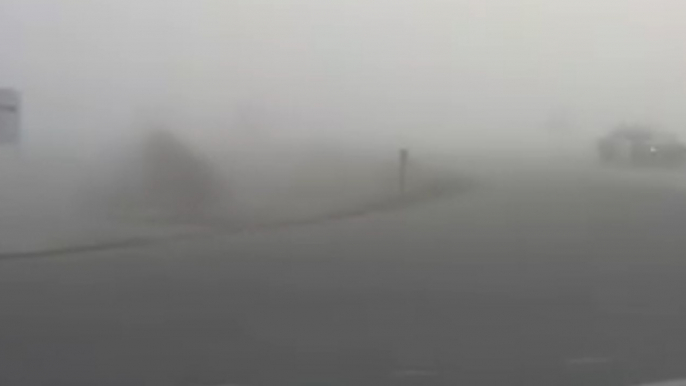 California Highway Patrol Guides Cars Through Dense Fog