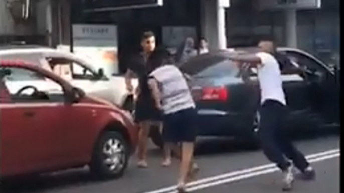 Mid-Road Brawl Blocks Traffic in Auburn, New South Wales