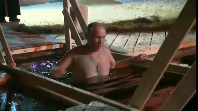 Putin takes an icy dip to mark Orthodox Epiphany.