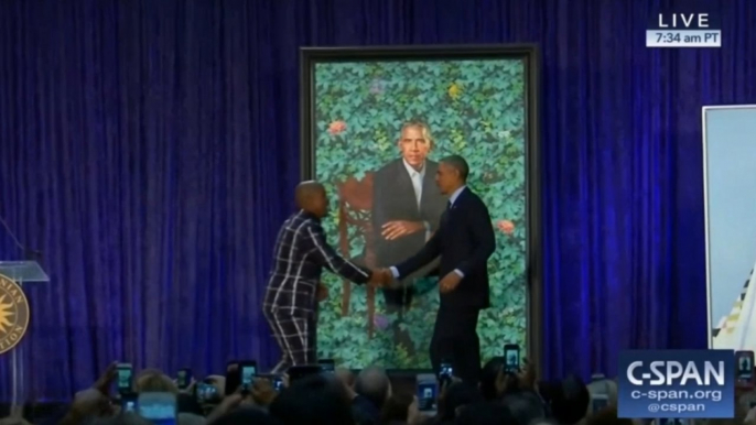 Barack and Michelle Obama presidential portraits unveiled