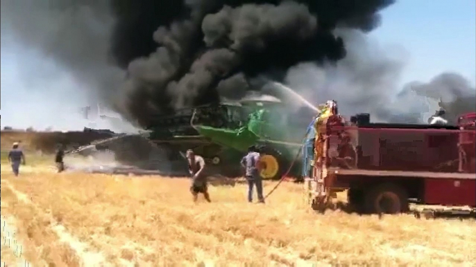 9770 John Deere combine on fire