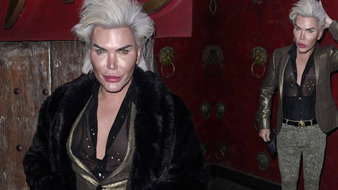 Human Ken Doll Rodrigo Alves proudly flaunts his new figure in sheer shirt as he heads for dinner in New York City... after having four ribs removed in 60th surgical procedure.