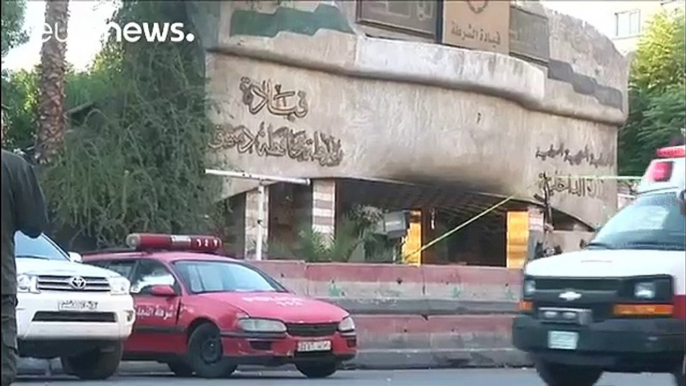 ISIL suicide bombers kill two police officers in Damascus