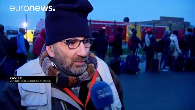 Calm prevails as first migrants leave Calais 'jungle' voluntarily