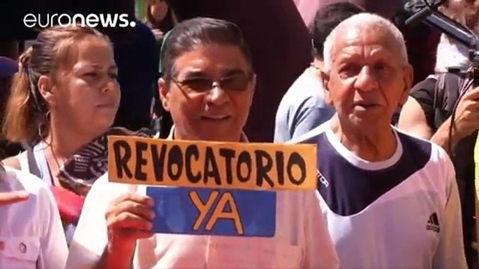 Venezuelan protesters demand a date for a recall referendum to oust President Maduro
