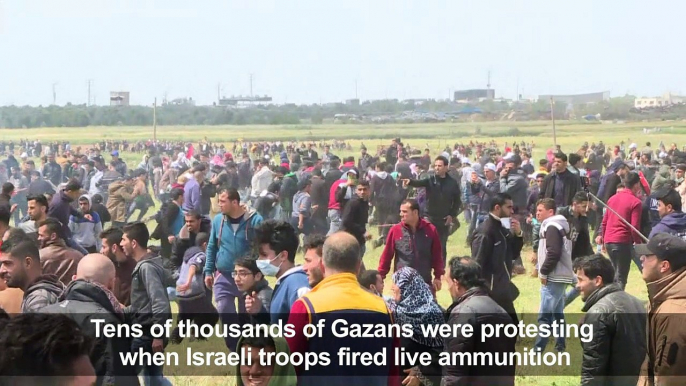 Bloody clashes as thousands of Gazans march near Israel border