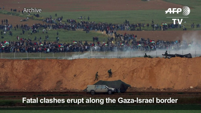 Clashes as thousands of Gazans march near Israel border