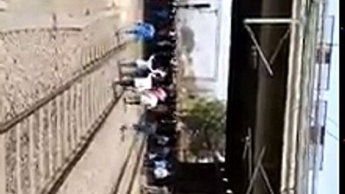 Strike in front of running train, Public stand in front of train